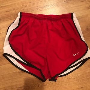 Red Nike shorts